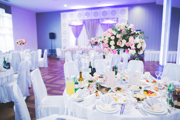 Interior of a restaurant prepared for wedding ceremony