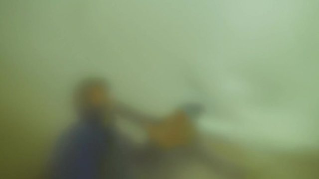 The monster attacks a man in a fog. The joke version