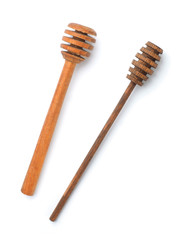 Set of wooden honey wands on the white isolated background