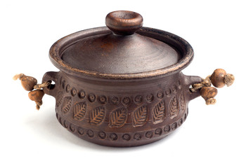 Traditional brown clay pot on isolated white background