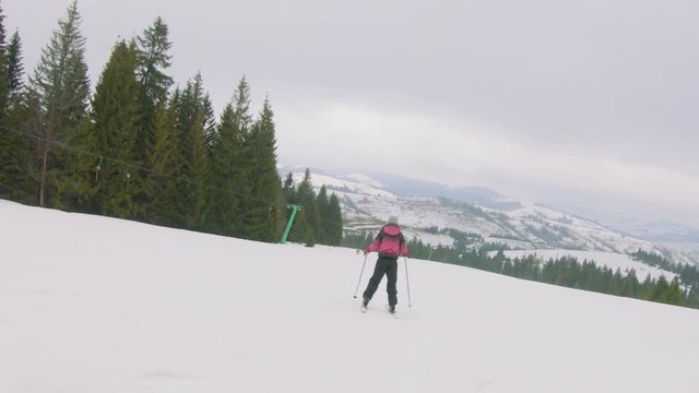Young girl skiing on mount, in Transcarpathia.  Shooting on action camera