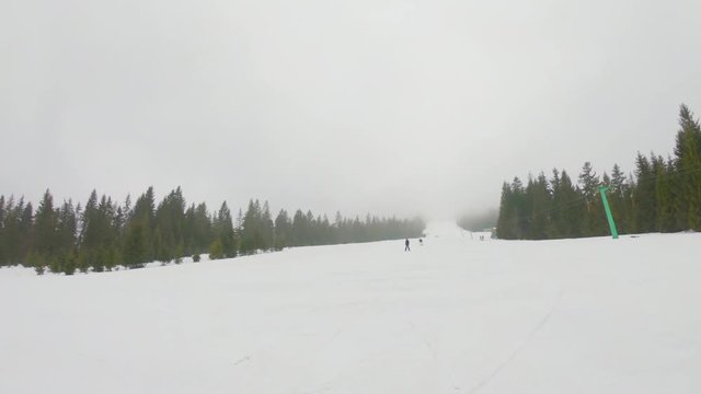 Young man skiing on mount, in Transcarpathia.  Shooting on action camera