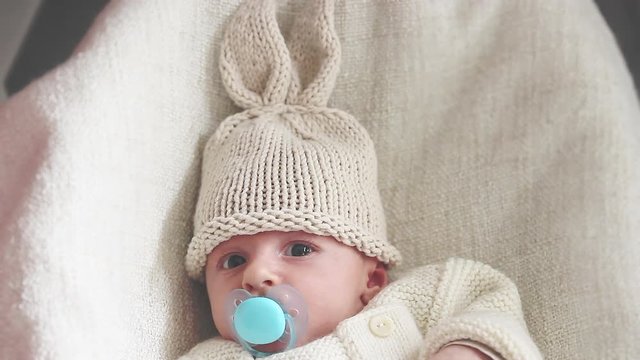 Cute Newborn Baby Boy With Bunny Hat