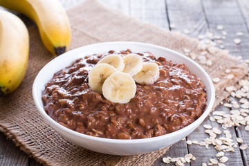 Chocolate oatmeal in white bowl