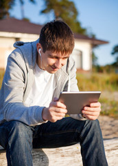 Young Man with a Tablet