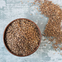 Buckwheat cereal in brown bowl.