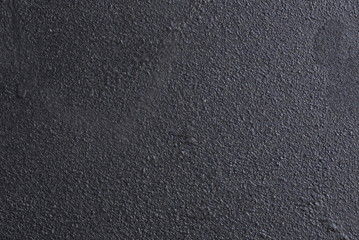 Black relief metallic texture as a background 
