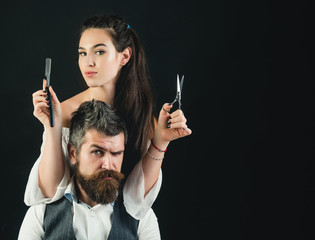 Young handsome man with long beard and woman