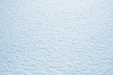 Fresh snow background texture. Winter background with snowflakes and snow mounds.