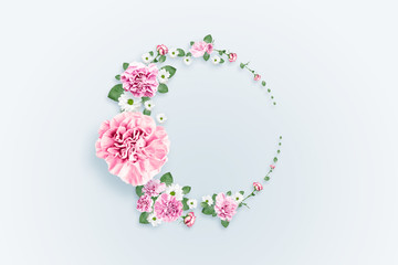 Pattern of pink and beige roses and green leaves on a white background. flat lay, top view, Mixed media. Spring background, Valentine's day, March 8