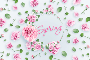 Pattern of pink and beige roses and green leaves on a white background. flat lay, top view, Mixed media. Spring background, Valentine's day, March 8