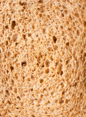 close up texture of brown rye bread macro detail food