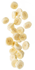 Peeled banana slices are falling down. Vertical picture.