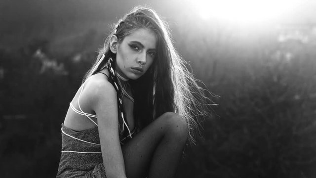 Sensual girl at the sunset. Beauty romantic girl outdoors. beautiful woman in sun light. Blowing long hair. Autumn. Glow sun, sunshine. Backlight. Subculture. Emo girl. Postapocalypse girl. Steampunk.