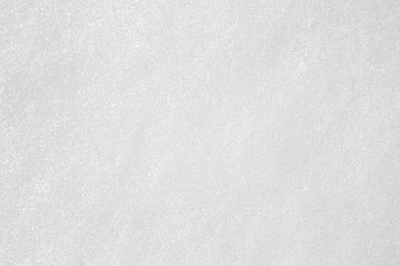 Obraz premium white even sparkling snow. texture uniform background. top view
