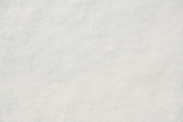 Fototapeta premium white even sparkling snow. texture uniform background. top view