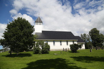 Fototapeta premium Church in Norway on sunny weather and blue sky