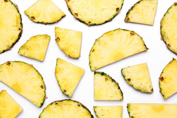 Fresh pineapple isolated on white background. Close-up of fresh pineapple. Pineapple in a section, top view. Flat lay.