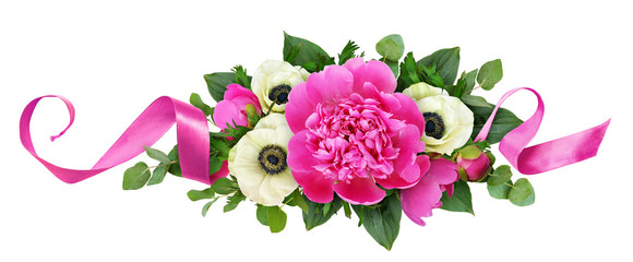 Pink peonies and anemone flowers in floral arrangement