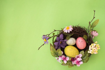 Happy Easter. Congratulatory easter background. Easter eggs and flowers.