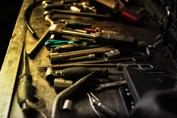 Mechanic tools on dirty work table
