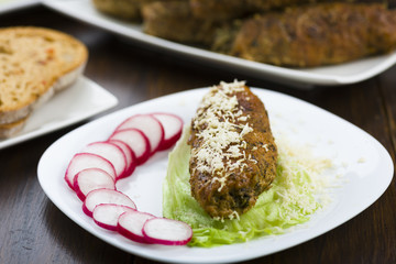 pork roulades stuffed with spinach sprinkled with freshly grated horseradish