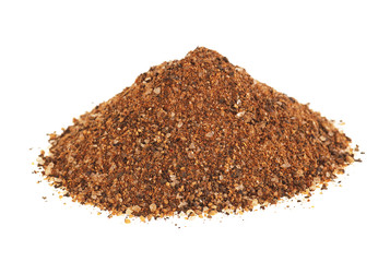 Mixture of ground peppers on a white background