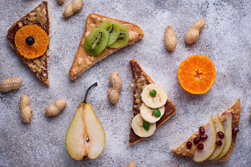 Healthy  sandwiches with peanut butter and fruits
