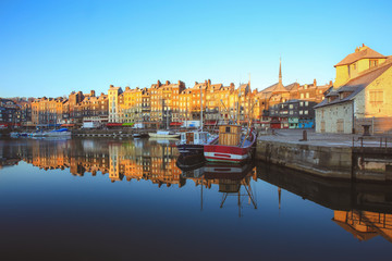 Waterfront of Honfleur harbor with colourful houses in Normandy, France