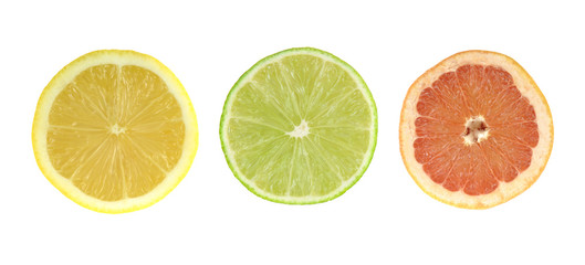 Fototapeta premium Citrus slices - lemon, lime, grapefruit. Colored set isolated on white background