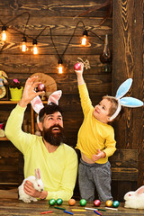 Easter family with fake bunny ears.