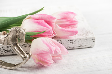 Tulips and rocking horse