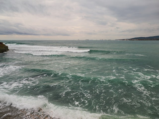 Beautiful view of the water with waves and sea foam in the Black Sea