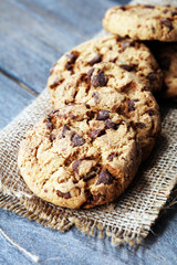 Chocolate cookies on wooden table. Chocolate chip cookies