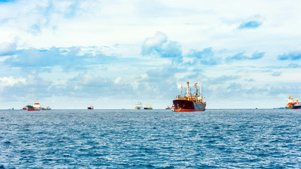 Merchant ships near the shore, Male, Maldives. Copy space for text.