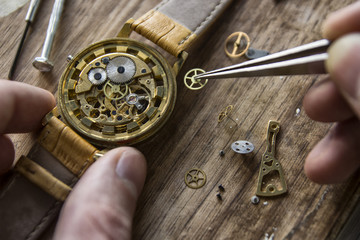 Process of installing a part on a mechanical watch, watch repair