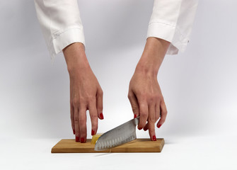 women's hands in the kitchen.