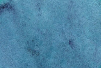 Obraz premium Abstract textured watercolor background of a saturated blue color. Grunge element for creative design