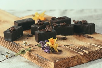 chocolate candy souffle on a wooden board.