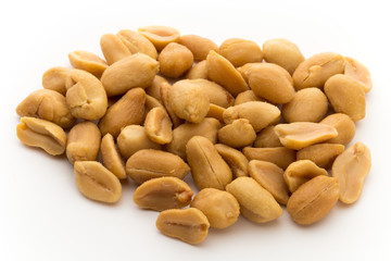 Peeled peanuts on the isolated background.