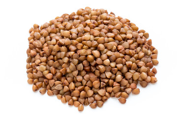 Buckwheat grains isolated on the white background.
