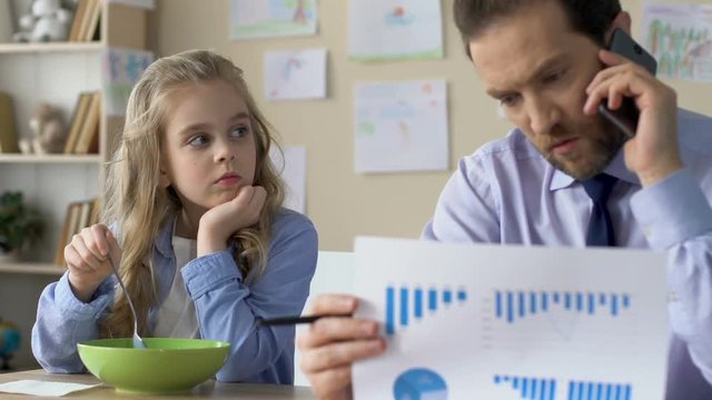 Upset daughter looking at working father, lack of family communication, ignore
