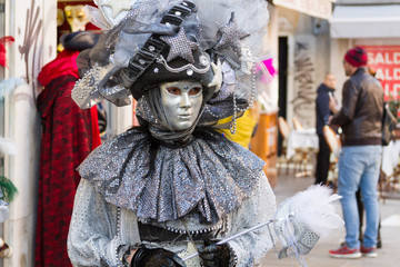Obraz premium Venezia (Venice), Italy. 2 February 2018. A person in mask on carnival in Venice.