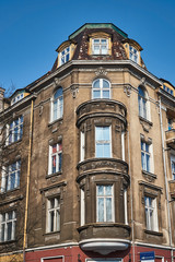 Fototapeta na wymiar Windows on the facade of the Art Nouveau building in Poznan.