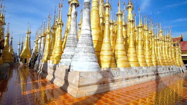 The group of golden stupas of Inn Thein Buddha image Shrine, located on the hilltop in Indein (Inn Thein) village, Inle Lake, Myanmar.