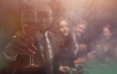 background image.poker players sitting at a table