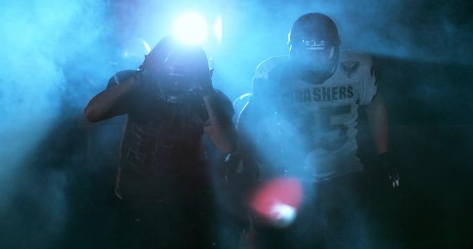 American football players in stadium during game