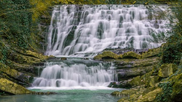 Fabulous waterfall in Caucasus mountains
