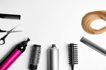 Naklejka premium Professional hairdresser tools on white background