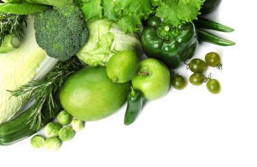 Green vegetables and fruits on white background. Food photography